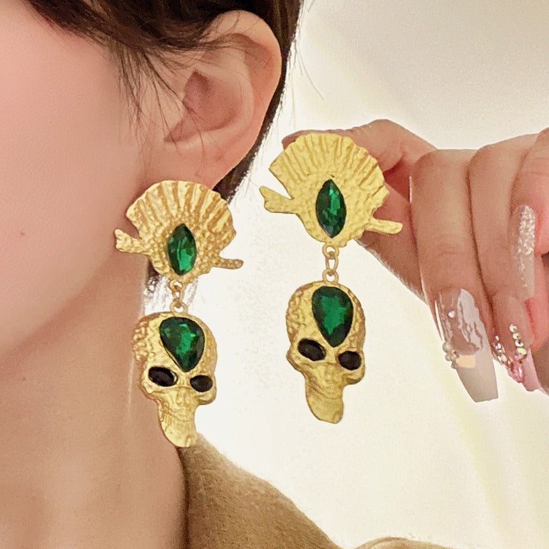 Fashion diamond studded skull earrings