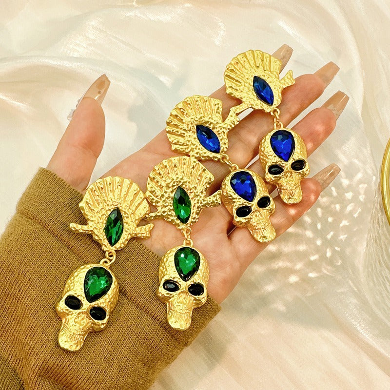 Fashion diamond studded skull earrings