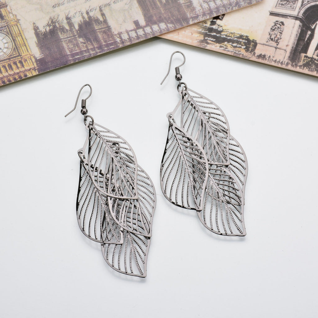 Simple and versatile, boastful leaf earrings for women, multi-layer metal hollowed out leaf earrings, earrings, and earrings