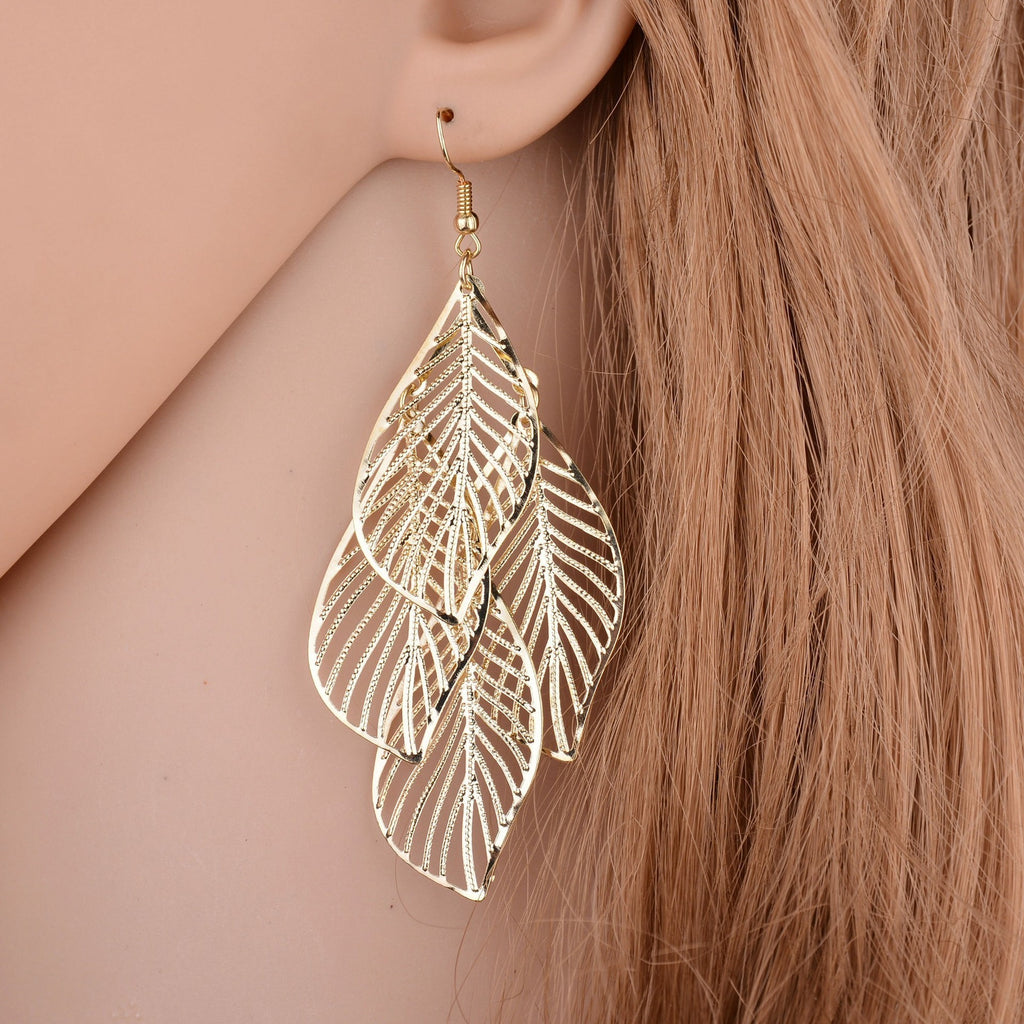 Simple and versatile, boastful leaf earrings for women, multi-layer metal hollowed out leaf earrings, earrings, and earrings