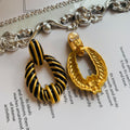 Exaggerated style black earrings