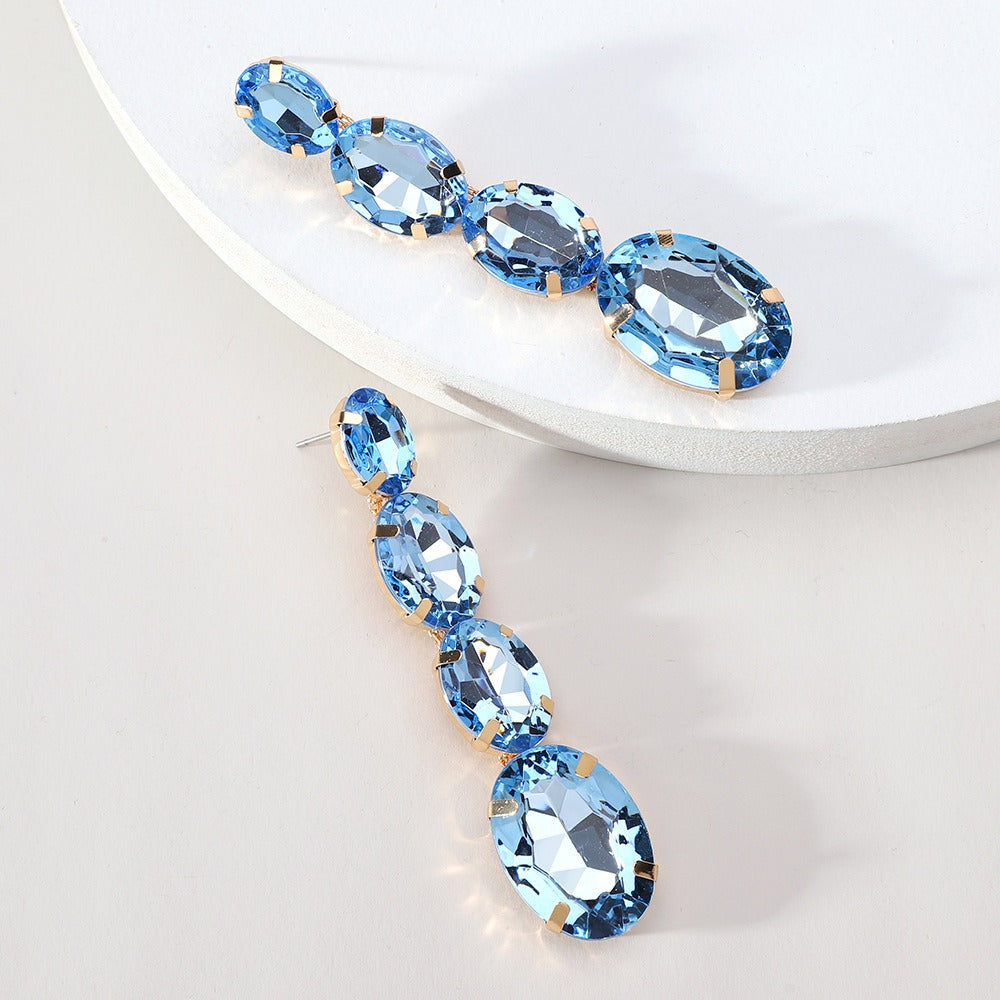 Oval crystal long pendant earrings, elegant, feminine, niche design earrings