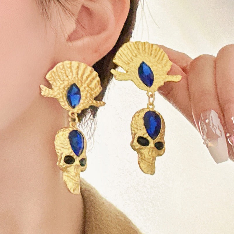 Fashion diamond studded skull earrings