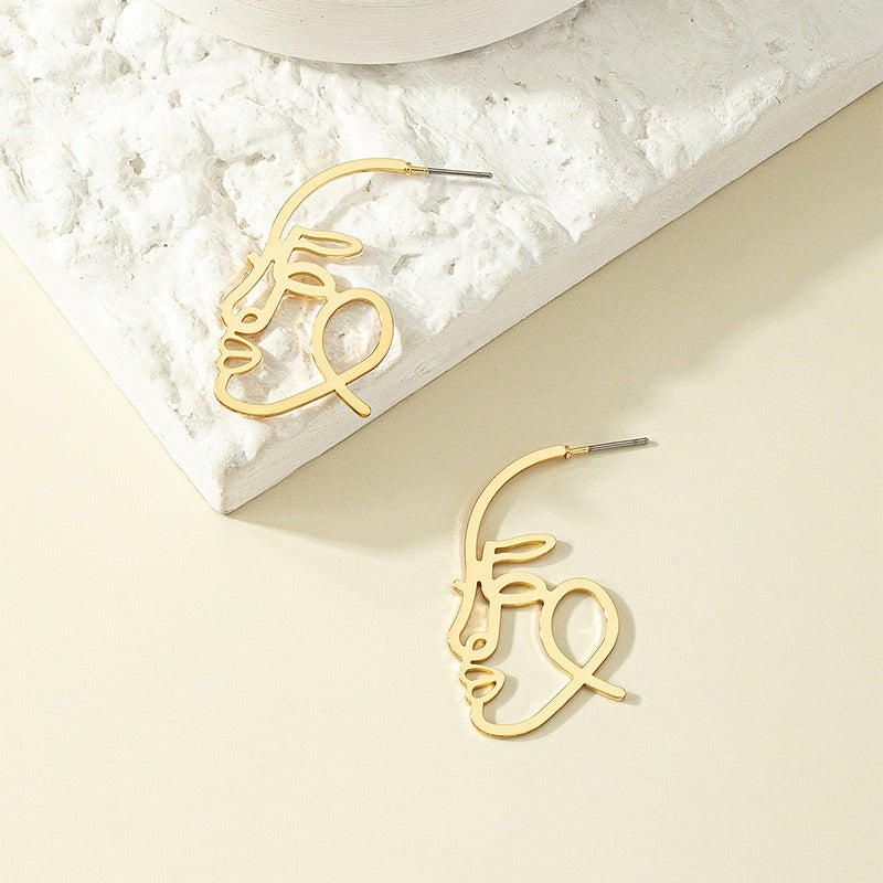 Individualized and exaggerated earrings with a female stroke facial sketch abstract figure earrings